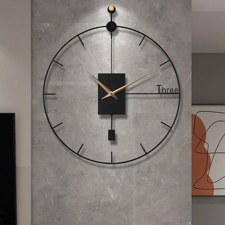 horloge murale design industriel métal noir aiguilles dorées pendule salon décoration moderne